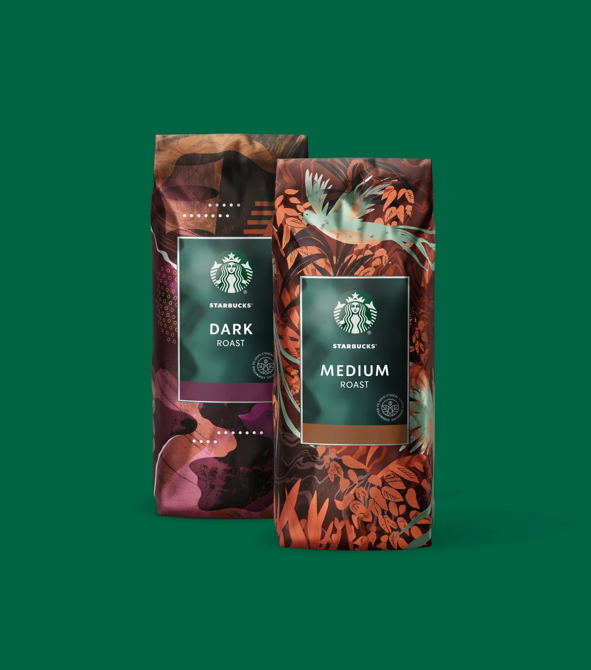 Two coffee bags from the Starbucks Selects subscription - the one on the left is labeled Dark Roast and on the right, Medium Roast, both on a green background.