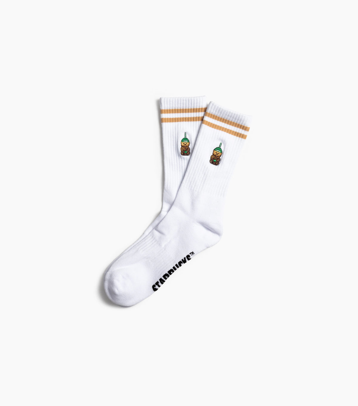 White socks with brown stripes and small graphic designs on a white background