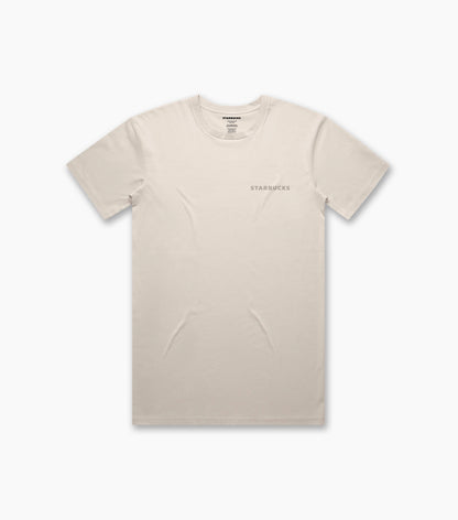 Front view of a natural off-white unisex essential T-shirt with a subtle tonal ‘STARBUCKS’ logo printed on the left chest.