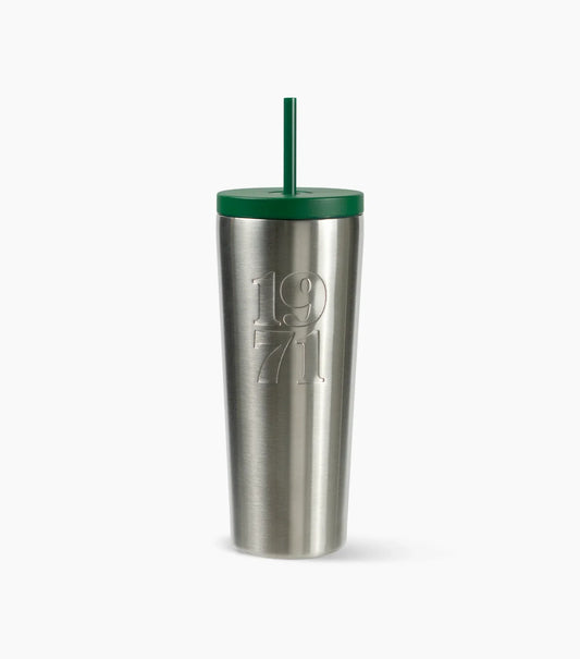 Stainless steel tumbler with a green lid and straw on a white background
