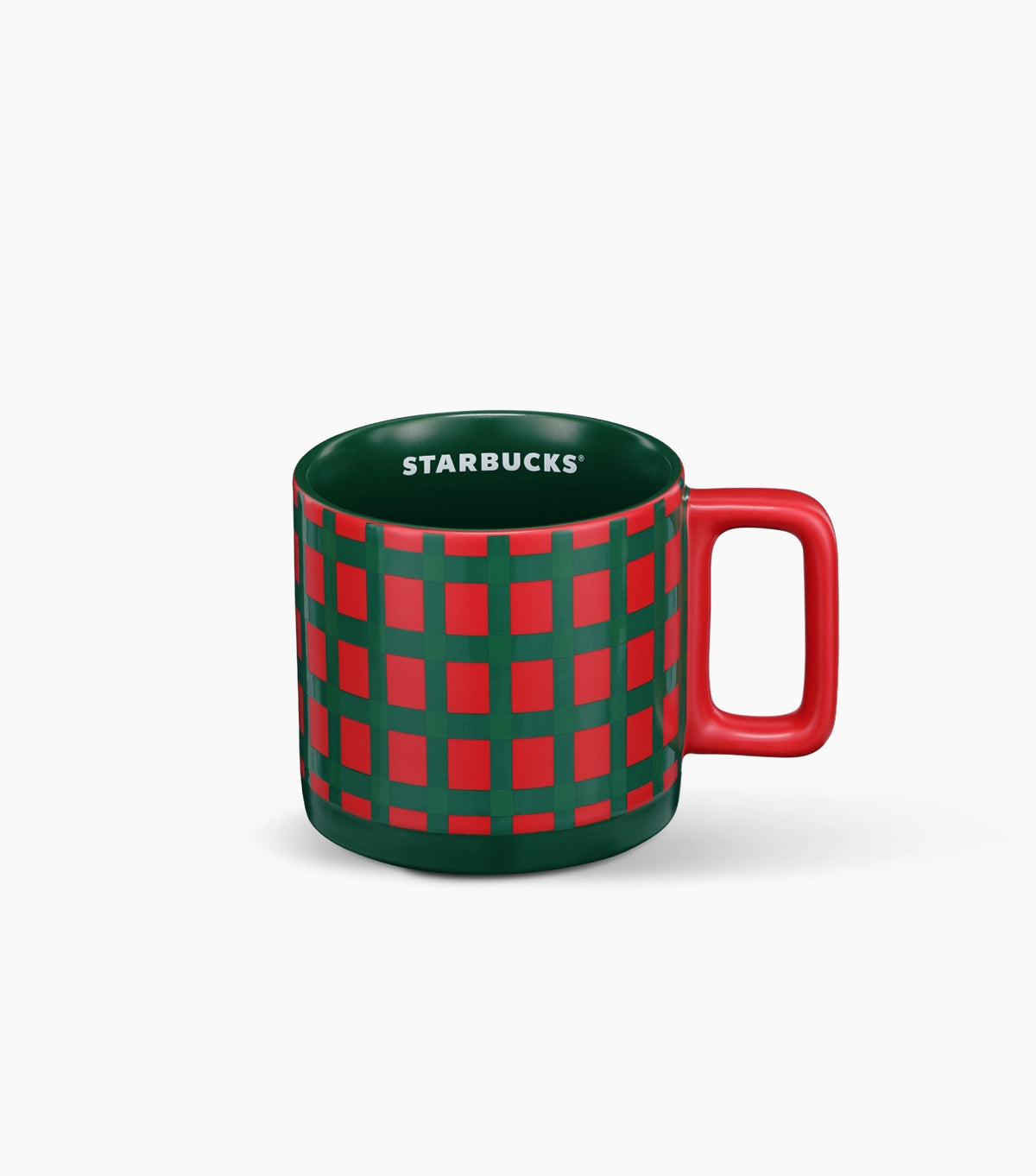 A Starbucks ceramic mug featuring a festive red and dark green plaid pattern, with a solid red handle and the white Starbucks logo printed on the inside of the rim, set against a clean white background.