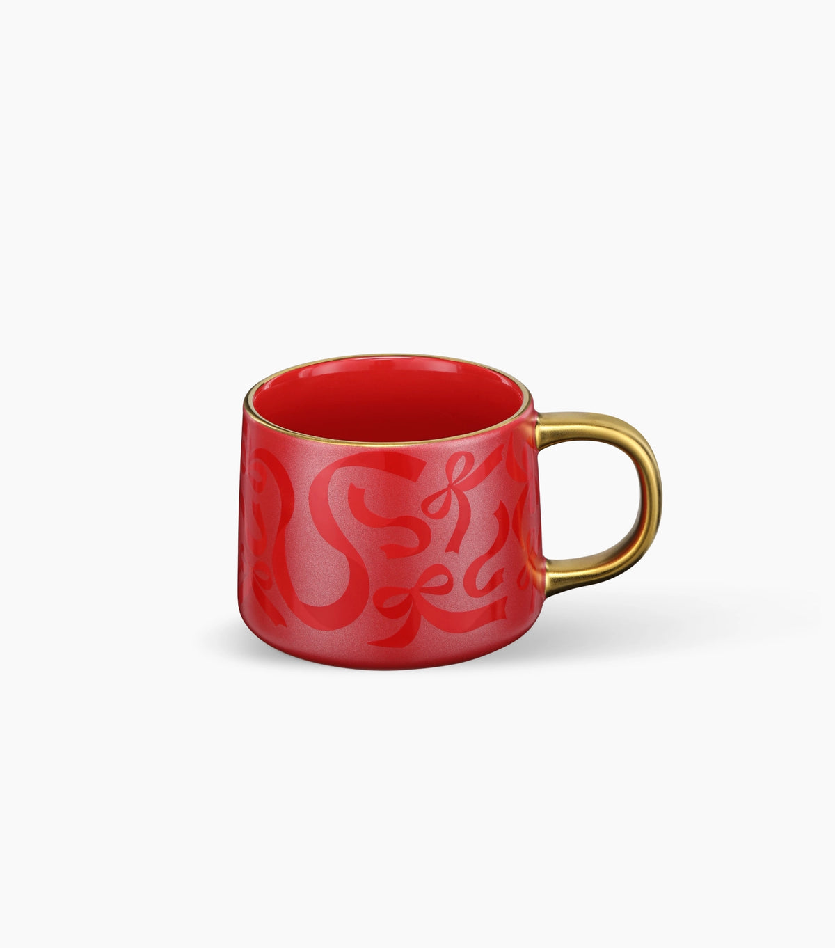 The other side of the red ribbon pattern mug, with the gold handle on the right, shown on a clean white background.