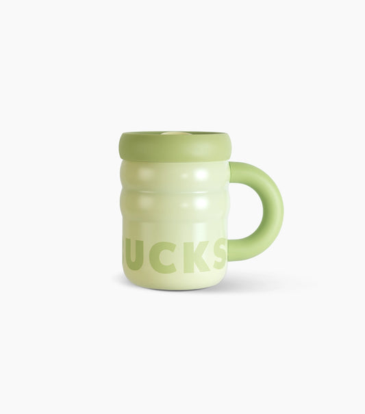 A light green stainless steel "Ripple" mug with a matching lid and handle, featuring the word 'STARBUCKS' printed wrapping around, set against a plain white background.