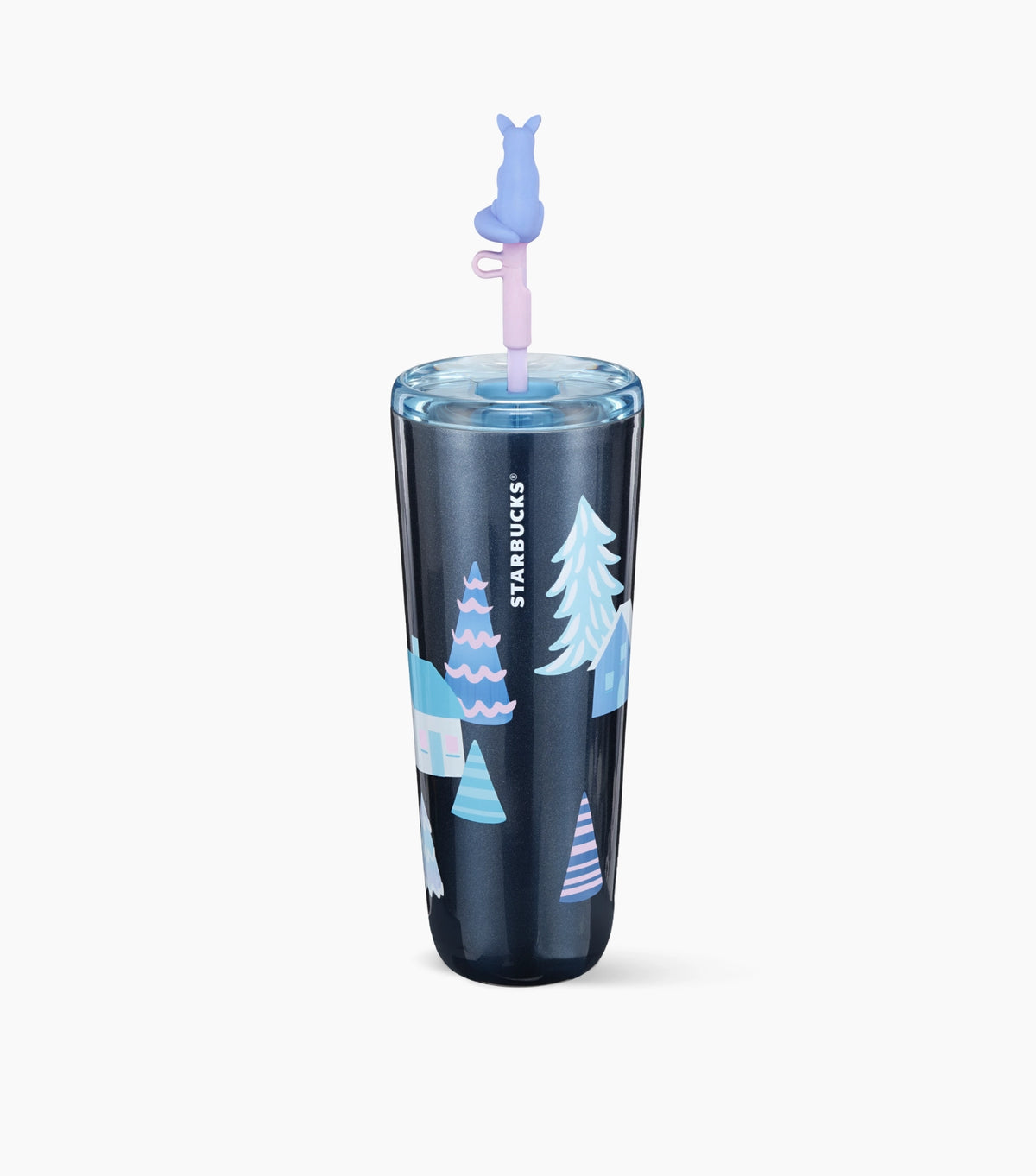 A dark navy blue Starbucks travel tumbler with a winter-themed illustration of houses and pine trees in shades of blue and white. The tumbler is shown with a clear lid and a straw topped with a light purple fox-shaped straw topper.
