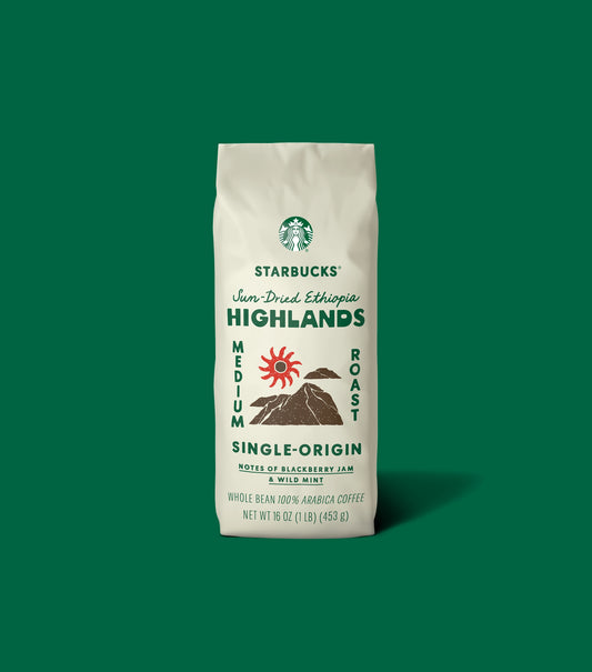 Starbucks Highlands coffee bag on a green background