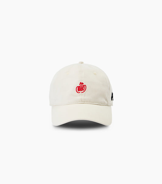 A natural colored cotton baseball cap featuring a red embroidered Pumpkin logo on the front and a small black tag on the side, set against a plain white background.