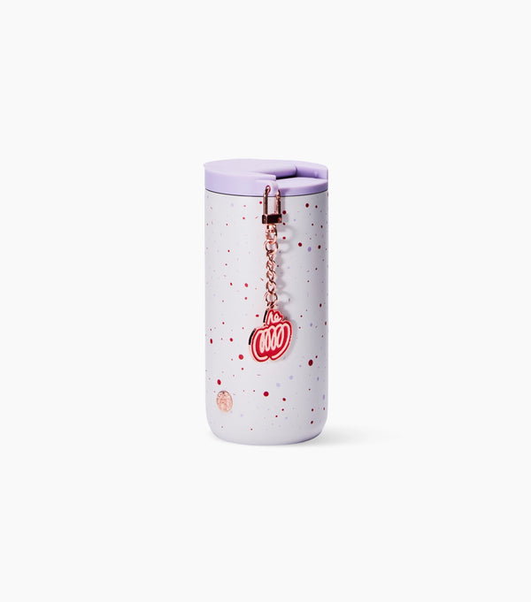 A light lavender travel tumbler with red speckles, a matching lavender lid, and a rose gold chain charm featuring a red 'PSL' design, set against a plain white background.