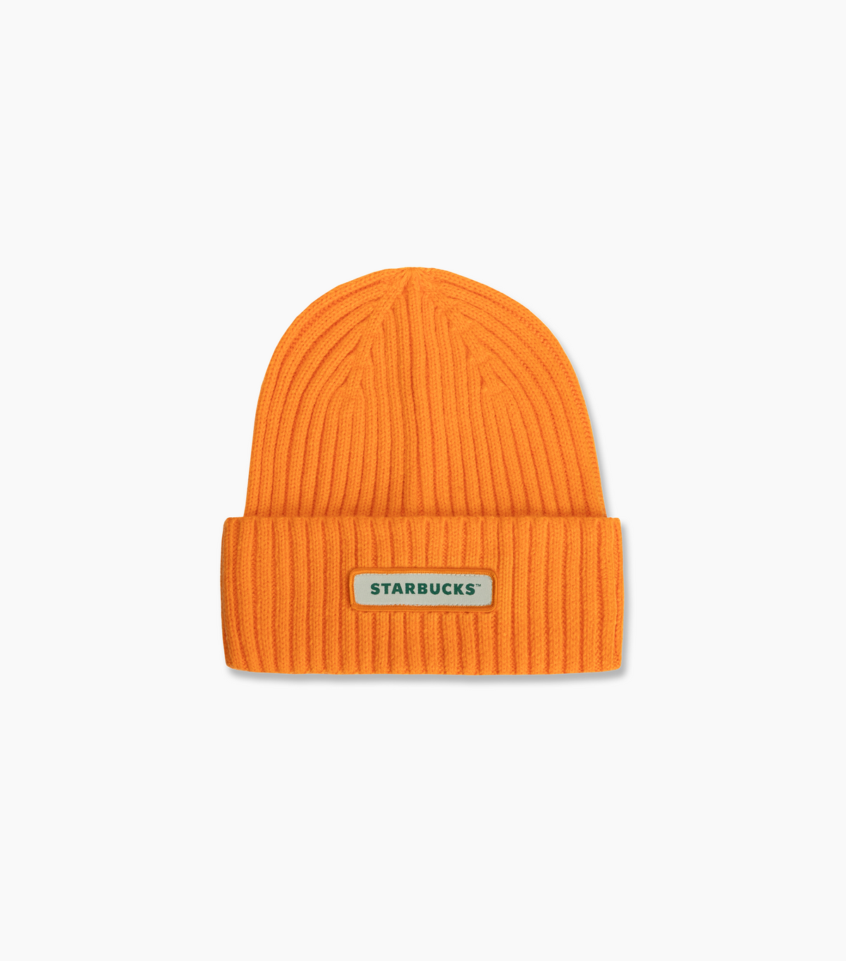 A bright orange ribbed knit beanie hat with a folded cuff and a small rectangular Starbucks logo patch on the front, centered on a light gray background.