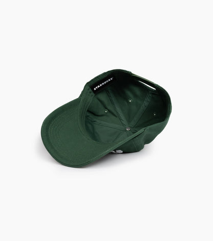 Interior view of Starbucks Collegiate Hat in green on white background