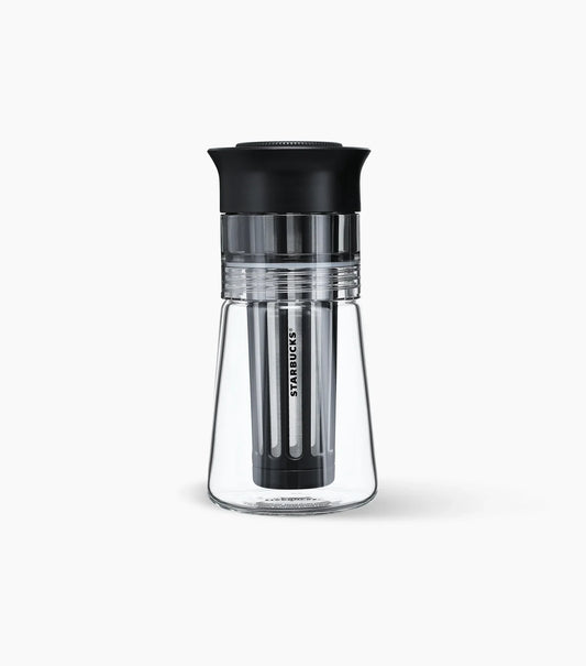 Clear glass Starbucks Cold Brew Coffee Maker with Starbucks brand name logo against a white background.