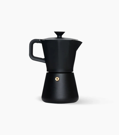 Black Miir Moka Pot Espresso Maker (handle to the left) on a white background.
