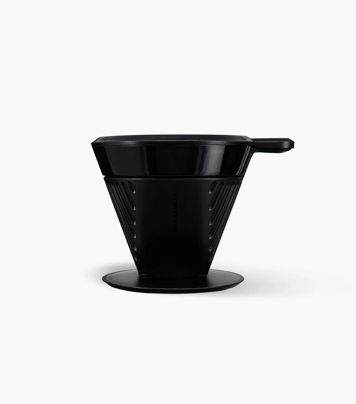 Black plastic Starbucks Pour-Over Brewer with handle towards the right, on a white background.