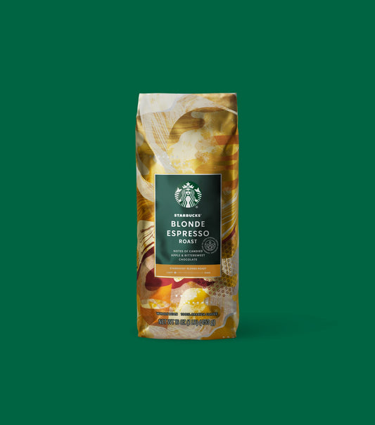 Starbucks Blonde Espresso Roast coffee bag on a light green background.