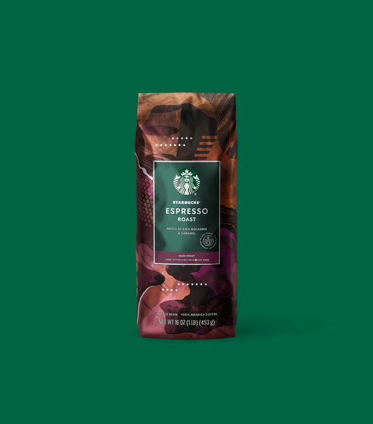 Starbucks Espresso Roast coffee bag on a light green background.