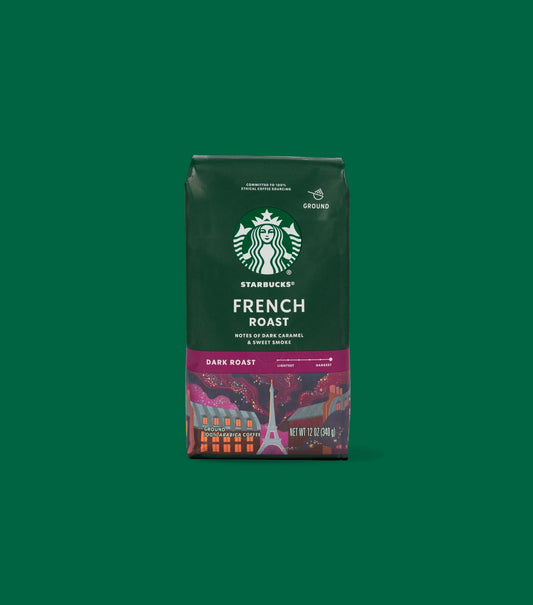 Starbucks French Roast Dark Roast ground coffee package bag on a green background.