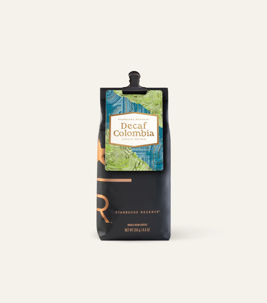Starbucks Reserve Decaf Colombia coffee bag on a cream background
