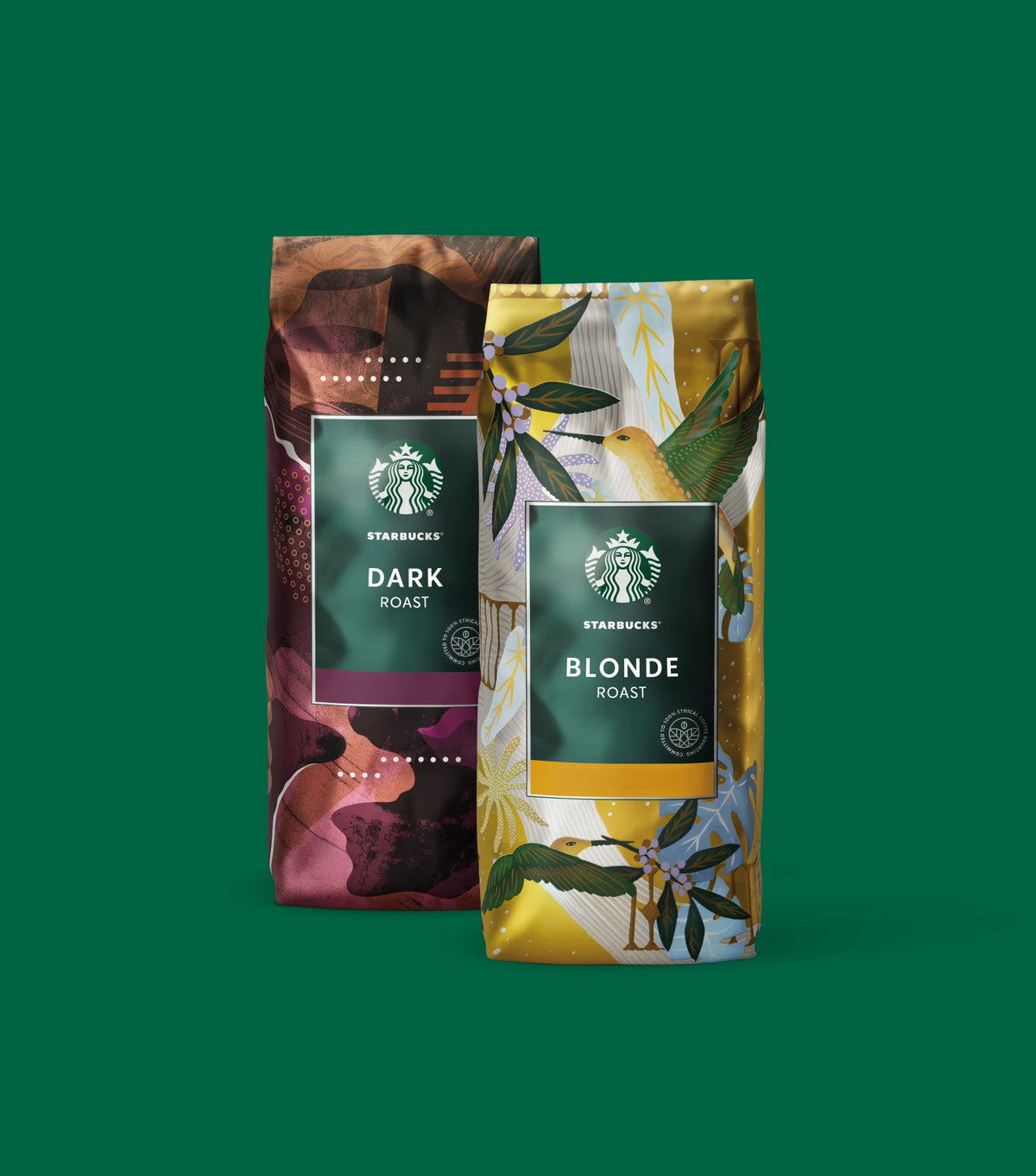 Two coffee bags from the Starbucks Selects subscription - the one on the left is labeled Dark Roast and on the right, Blonde Roast, both on a green background.
