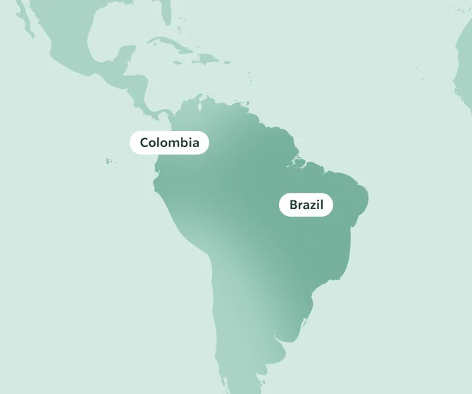 Map of South America highlighting Colombia and Brazil on a light green background.