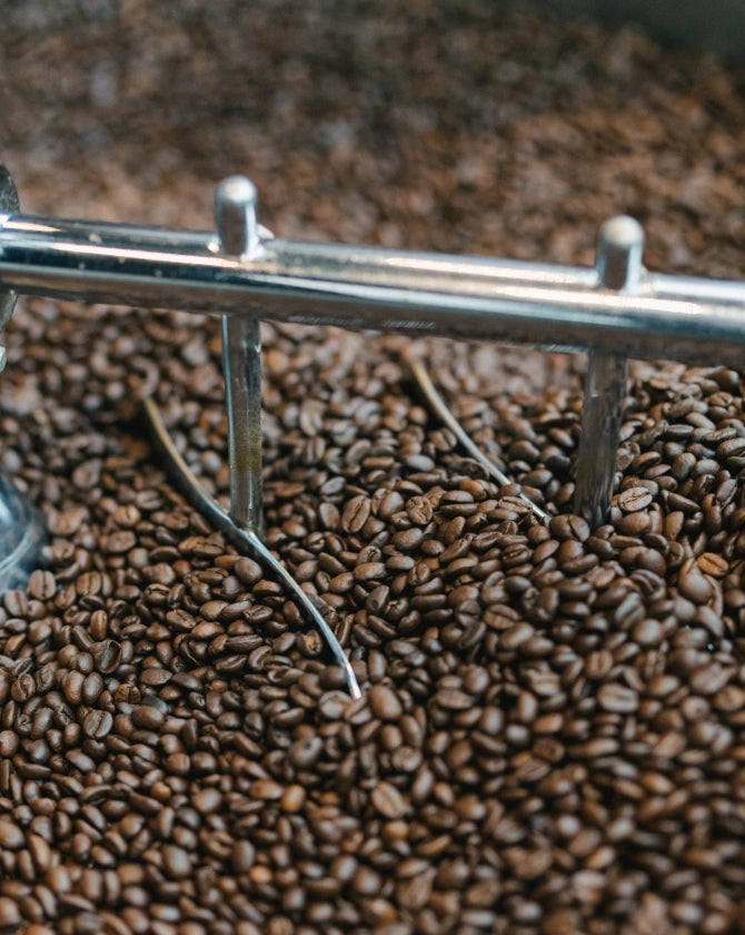 Coffee beans being roasted.